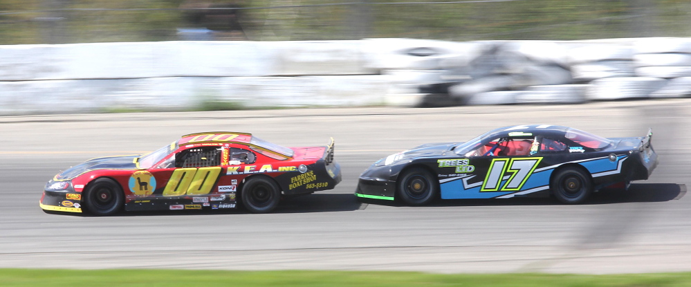 Sidney native Chris Thorne, in the No. 17 car, tries to get by Alex Waltz during a qualifying heat for the 2014 Coastal 200 at Wiscasset Speedway. Thorne, a three-time track champion, is one of the favorites in the race Sunday.