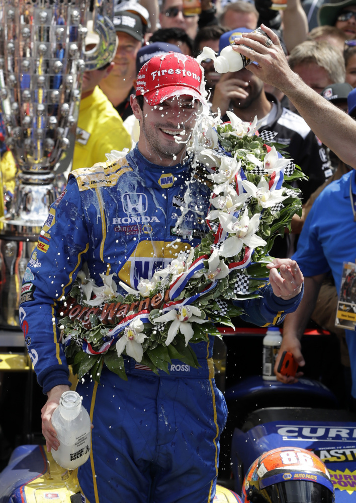 Alexander Rossi celebrates after winning the 100th running of the Indianapolis 500 on Sunday at Indianapolis Motor Speedway in Indianapolis.