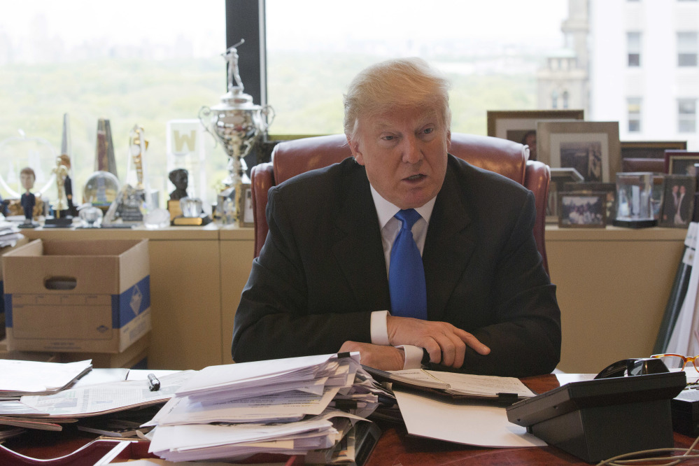 Donald Trump gives an interview in his office at Trump Tower in New York in May.