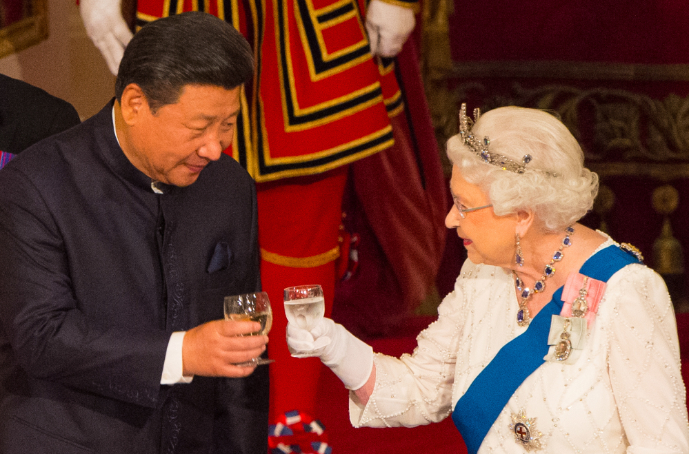 Chinese President Xi Jinping toasts Britain's Queen Elizabeth II during a state banquet at Buckingham Palace in London last fall.