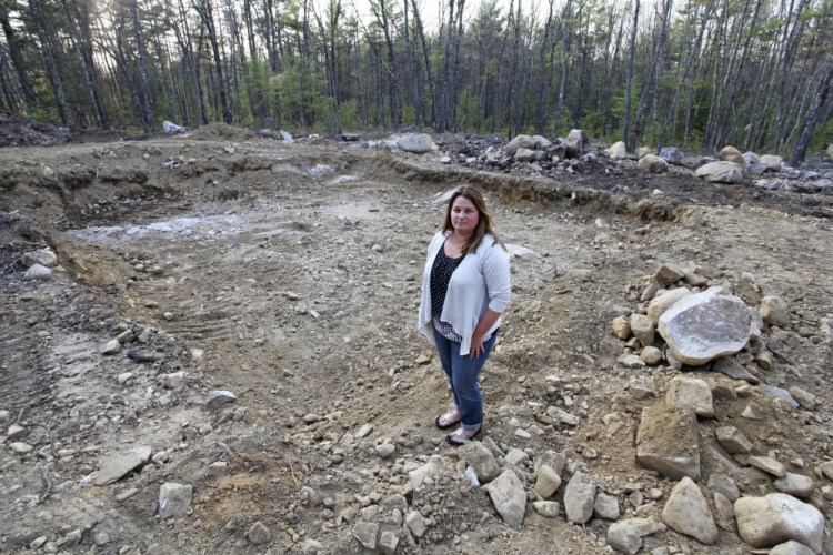 Autumn Poulin paid a $20,000 deposit to Keiser Homes for a modular home she planned in Wells, but the company's bankruptcy leaves her out the money and with a partially dug foundation hole.