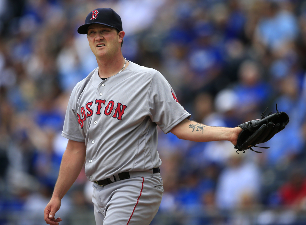 Boston Red Sox pitcher Steven Wright reacts after giving up a first-inning home run to Eric Hosmer of the Kansas City Royals on Wednesday afternoon./AP photo
