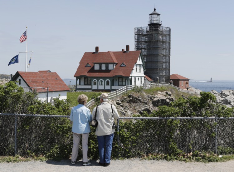 Rose and Richard Ouellette of Michigan visit Fort Williams Park on Monday. The Ouellettes' late son was an artist who loved painting lighthouses, especially Portland Head, said Rose Ouellette, who was disappointed to not be able to see the lighthouse.