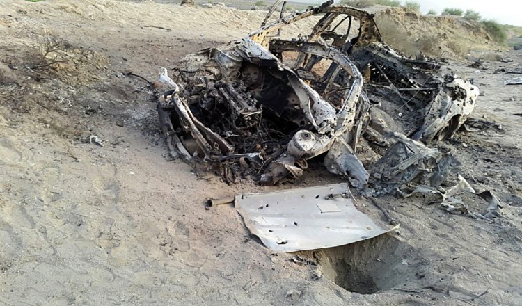 This photo purports to show the destroyed vehicle in which Mullah Mohammad Akhtar Mansour was traveling in the Ahmad Wal area in Baluchistan province of Pakistan, near Afghanistan's border, when he was believed to have been killed in a drone strike.