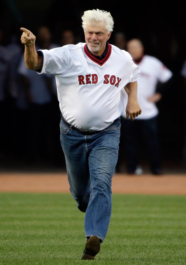 Former Red Sox pitcher Bill "Spaceman" Lee runs onto the field to join former teammates during pre-game ceremonies at Fenway Park in 2015. Lee is running for governor in Vermont as a member of the Liberty Union party. 