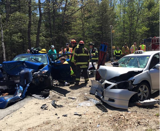 Rescuers respond to a two-vehicle crash that injured four people in New Gloucester Saturday. Photo courtesy WCSH TV