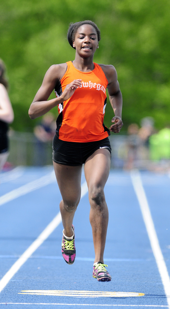 Skowhegan senior Maddy Price runs the 200 at the Kennebec Valley Athletic Conference championship meet Saturday at McMann Field in Bath.