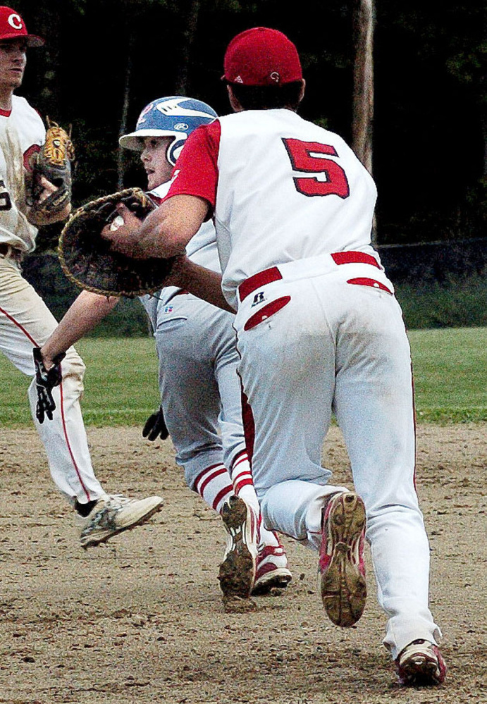 Messalonskee's Jonathan Wilkie is run down by Cony's Anthony Brunelle on Monday in Oakland.