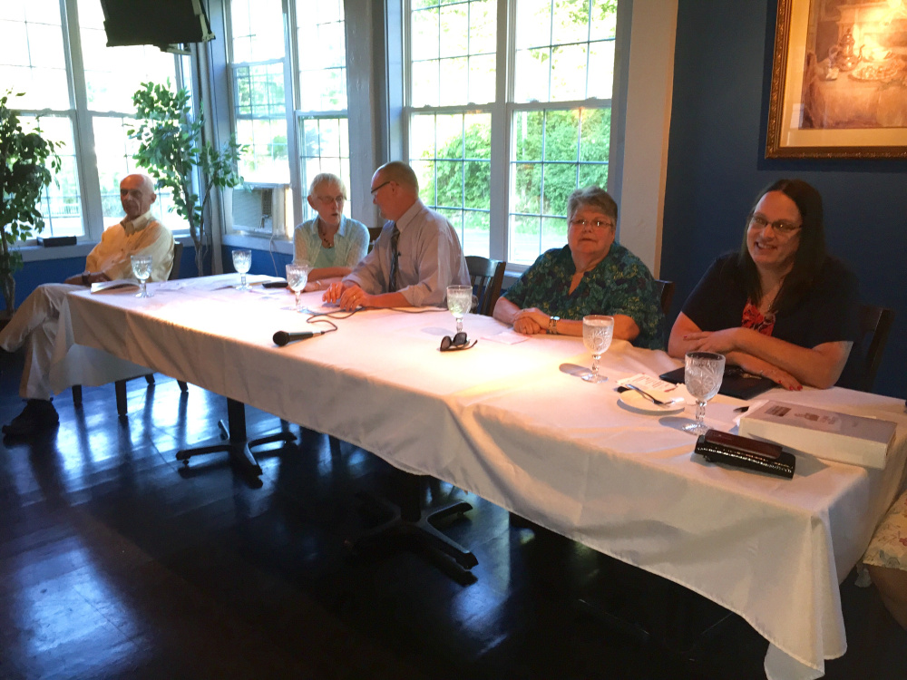 Wilton Selectboard candidates, from left, Tiffany Maiuri, Ruth Cushman, David Leavitt, Betty Shibles and Irving Faunce partake in a meet and greet event Monday night.