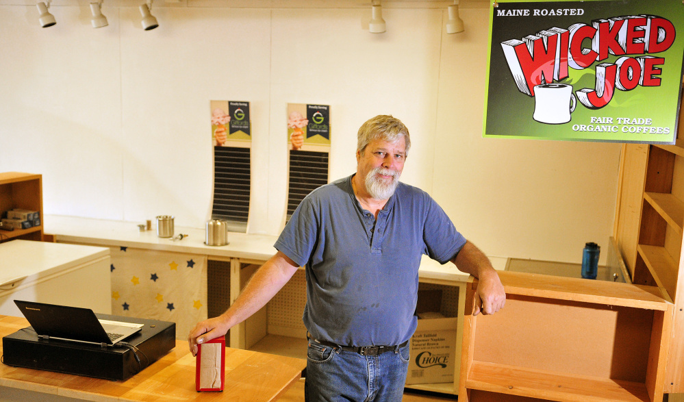 David Brown stands behind the counter last week at Coffee & Cones, which is in the former Apple Valley Books store on Main Street in Winthrop.