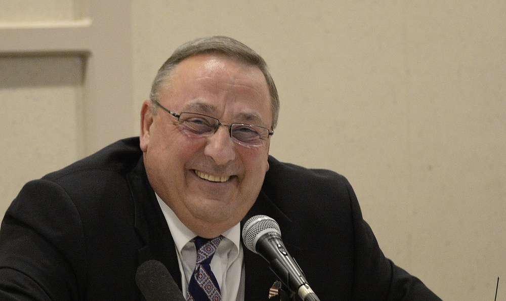 Gov. Paul LePage laughs during a town hall meeting in Lewiston on May 4.