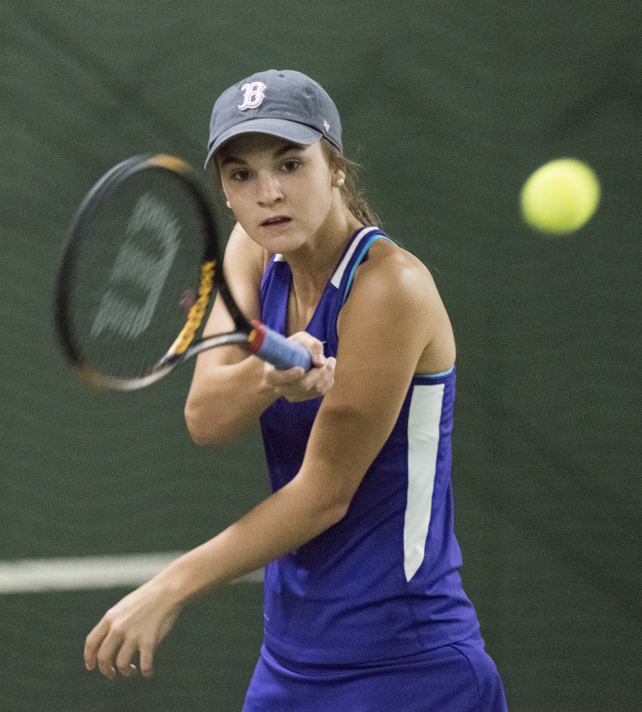 Waterville singles player Sammi Saulter competes against Camden's Kate Vannorsdall during the Class B North finals Tuesday in Hampden.