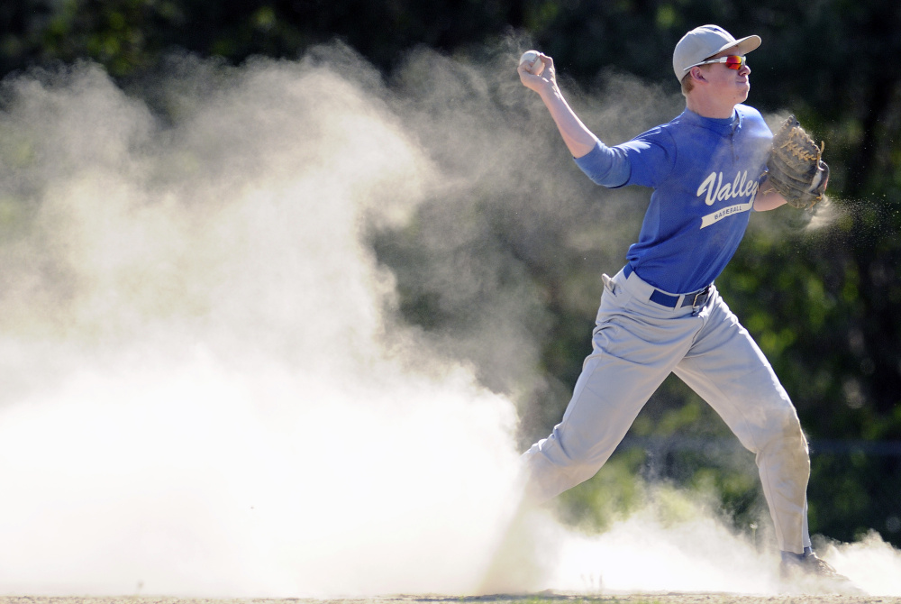 Valley shortstop Cody Lawerson throws to first through a cloud of dirt during an East/West Conference game against Richmond earlier this season. Laweryson is a finalist for the John Winkin Award.