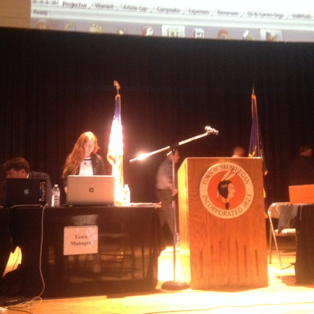 Skowhegan Town Manager Christine Almand gets ready at the podium Monday night for the annual Town Meeting.