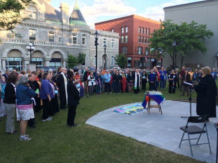 More than 100 people gathered Tuesday evening in Augusta's Market Square Park for a ceremony organized by the Capital Area Multifaith Association to remember the victims of the Orlando shootings.