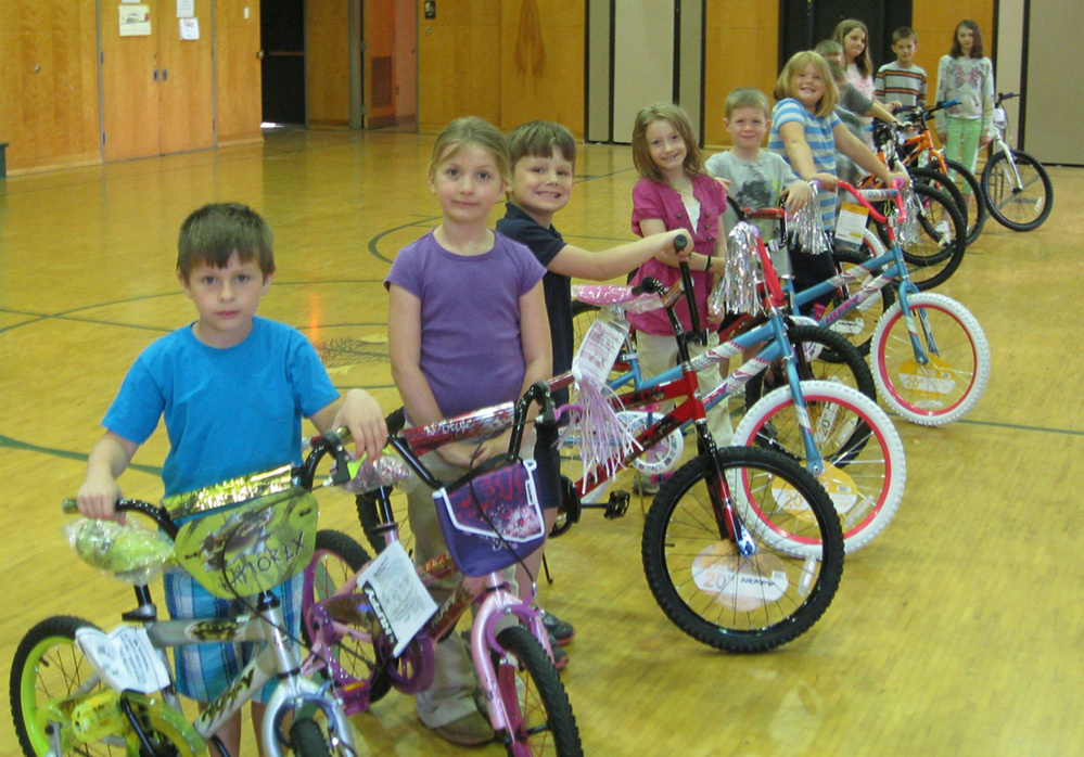 The Garret Schenck Elementary School winners of the Bikes for Books program from left, were Jesse Cookson and Kaylee Schinzel in kindergarten, Michael Abbott and Patience Rowe in grade 1, Seth Hansen and Willow Page in grade 2, Lilly Waugh (absent) and Matthew Ladd in grade 3, Tyler Hansen and Brooke Dube in grade 4, and Andrew Rowe and Autumn Ladd in grade 5.