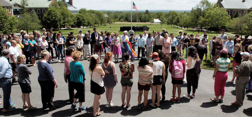 As the American flag hangs at half staff, nearly 150 people on Wednesday attended a vigil at Colby College in Waterville for the victims of the Orlando shooting last Sunday. The event included a moment of silence, prayers and emotional statements in support of the victims, the gay community and stronger gun laws.