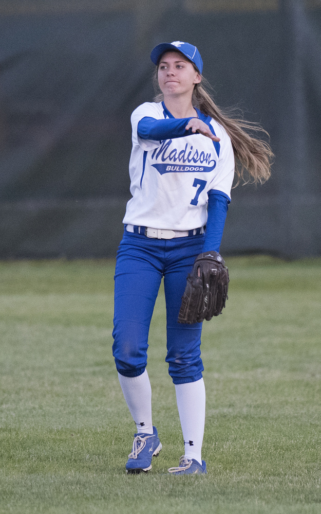 Madison sophomore outfielder Sydney LeBlanc fields a ball during the Class C South championship game on Tuesday night at St. Joseph's College in Standish.
