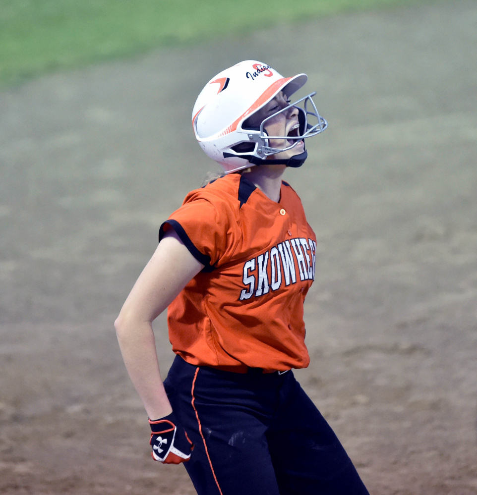 Skowhegan sophomore Ashley Alward celebrates after she belted an RBI triple against Edward Little in the Class A North title game Tuesday night in Augusta.