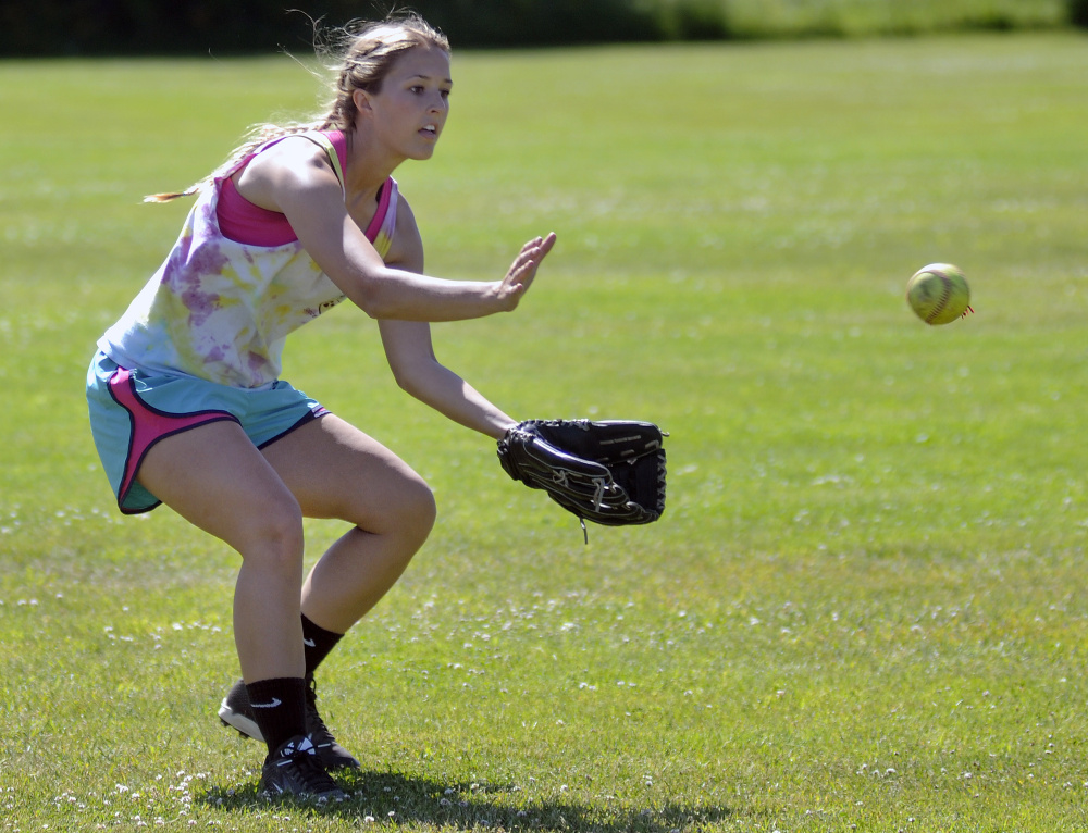 Richmond senior center fielder Autumn Acord fields a ball during practice Thursday in preparation of the Class D state championship game Saturday against Stearns.
