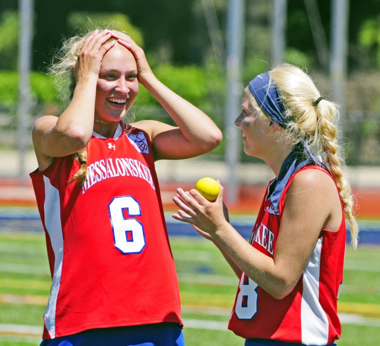 Messalonskee attacker Ally Turner, left, and senior Nathalie St. Pierre celebrate after the Eagles beat Massabesic 7-6 in overtime to win the Class A state title Saturday at Fitzpatrick Stadium in Portland.