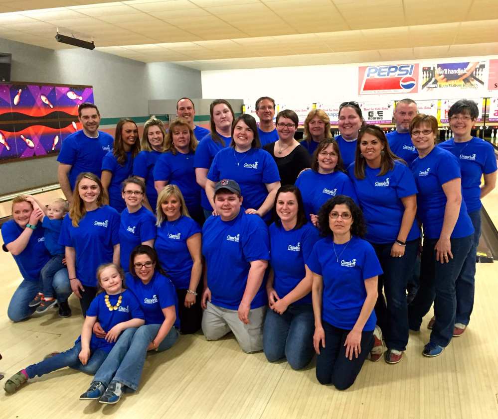 More than 170 Camden National Bank employees recently joined efforts to support Big Brothers Big Sisters of Mid-Maine at Bowl For Kids' Sake. One of the Kennebec county teams, included, sitting, from left, Ursula Godin and daughter Morgan Buswell; first row, from left, Alisha Robinson and son Brayden Kramer, Taylor Banister, Makala Ouellette, Donna York, Wes Huckey, Leanne Churchill and Lucie Glover; second row from left, Ken Demuth, Amanda Gagnon, Alicia Beaulieu, Tricia Harriman, Holly Morin, Morgan Huckey, Kate Labbe, Amy Black, Nikki Shaw and Pat Harris; and back row, from left, Nate Cotnoir, Robert Black, Carol Oliver, Lisa Buzzell, Chip Shaw and Carolyn Moss.