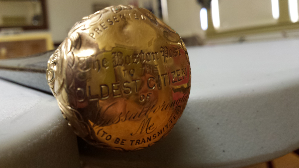 Vassalboro's Boston Post Cane, which is in the possession of the Vassalboro Historical Society, will be presented to the oldest resident in town at Vassalboro Days in September if the society can find the person.