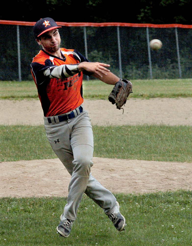 Messalonskee's Noah Tuttle throws to first base during a junior American Legion game Tuesday against Skowhegan at Memorial Field in Skowhegan.