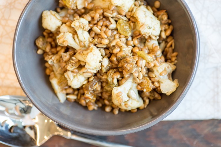 A wheat berry salad with cauliflower and raisins is a great fast breakfast, lunch or dinner.   Dixie D. Vereen/For The Washington Post