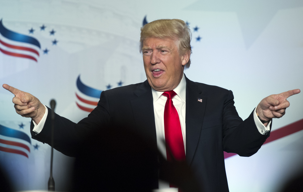 File photo: Donald Trump points to the audience Friday after addressing the Faith & Freedom Coalition's Road to Majority conference in Washington, where he touted his opposition to abortion and commitment to religious freedom – issues he rarely discussed during his successful campaign to secure the Republican presidential nomination.