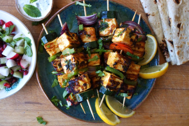 Spicy grilled paneer can be grilled without melting so that it softens in the middle and chars on the edges.   Associated Press/Meera Sodha