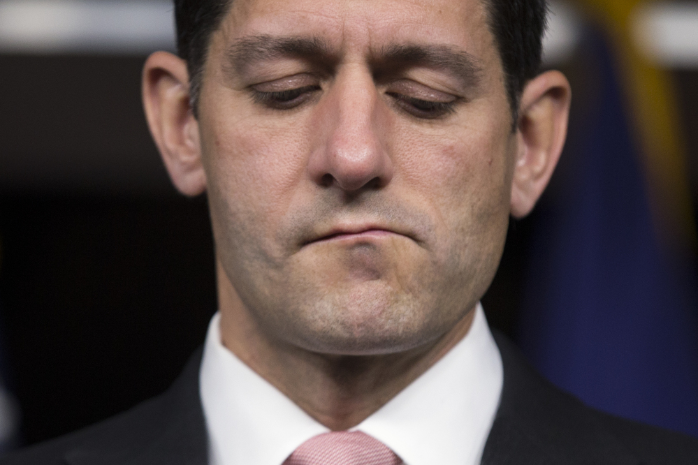 House Speaker Paul Ryan of Wisconsin listens to a question during a news conference on Capitol Hill in Washington on Thursday. He called the Democratic sit-in a publicity stunt.