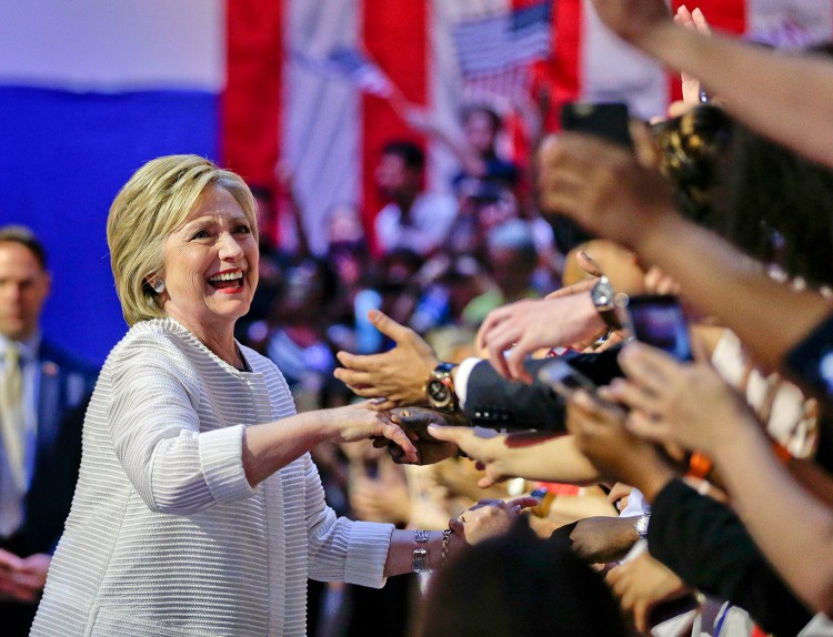 Democratic presidential candidate Hillary Clinton greets supporters as she arrives to speak during a presidential primary election night rally Tuesday in New York.