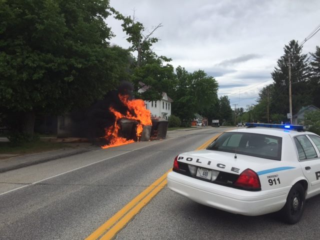 Two Central Maine Power workers pulled a man from his truck after it hit a utility pole in Bridgton on Thursday. The crash pulled down wires and set the truck ablaze.