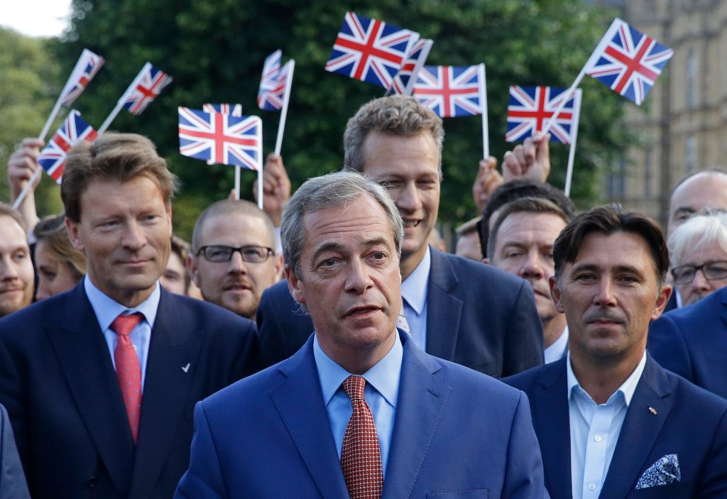 FILE - In this Friday, June 24, 2016 file photo, Nigel Farage, the leader of the UK Independence Party speaks to the media on College Green in London, Friday, June 24, 2016.  (AP Photo/Matt Dunham, File)