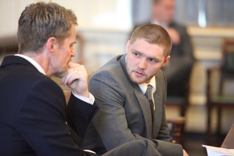 Carlton L. Young, right, of Sanford listens to attorney Rick Winling in York County Superior Court during an appearance to enter his plea to a charge of felony murder Monday. He was charged in the death of 62-year-old Connie Loucks. He is accused of causing her to have a heart attack during an attempted burglary at her home in Wells.
