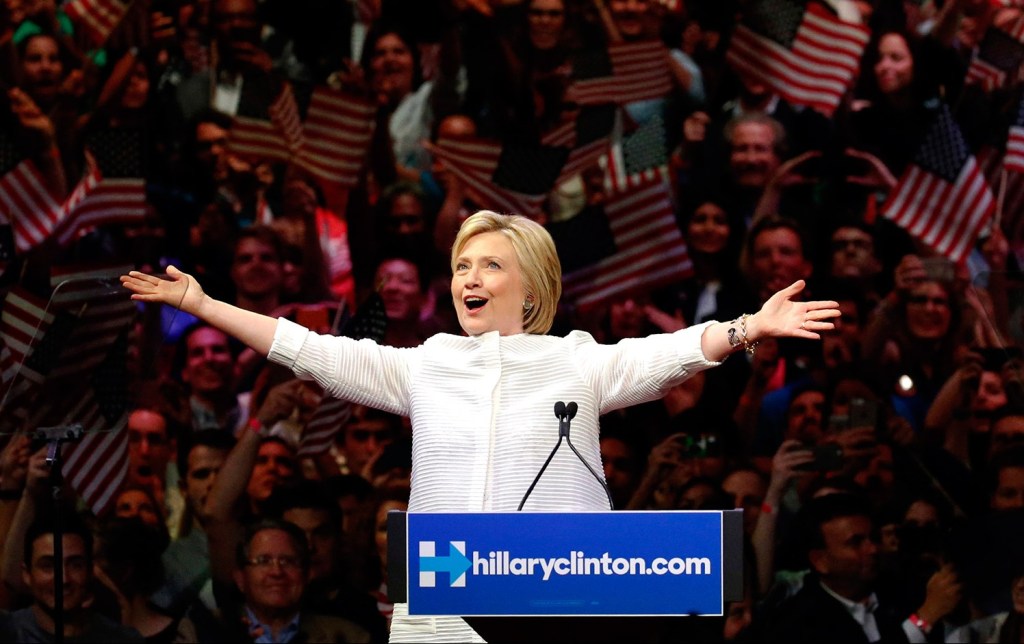 Hillary Clinton greets supporters at a rally in New York on Tuesday night as she claims the Democratic presidential nomination. 
The Associated Press/Julio Cortez