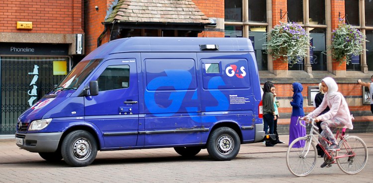 A G4S security van is parked outside a bank in Loughborough, central England, in August 2013. The company provides security for sports and rock stars in addition to 40 U.S. embassies and 32 juvenile-justice detention facilities in the U.S., including 28 residential centers in Florida. Reuters