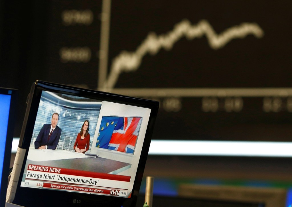 A news broadcast on a TV is pictured in front of the German share price index DAX board, at the stock exchange in Frankfurt, Germany after Britain voted to leave the European Union.    Reuters/Ralph Orlowski