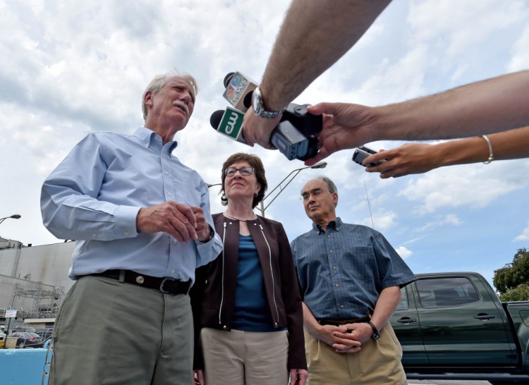 From left, Sen. Angus King, Sen. Susan Collins and Rep. Bruce Poliquin speak to reporters Friday after a tour of Sappi Fine Paper in Skowhegan. The delegation was at the paper mill to highlight creation of a federal team that will look at the future of the forest products industry in Maine and how to keep it viable.