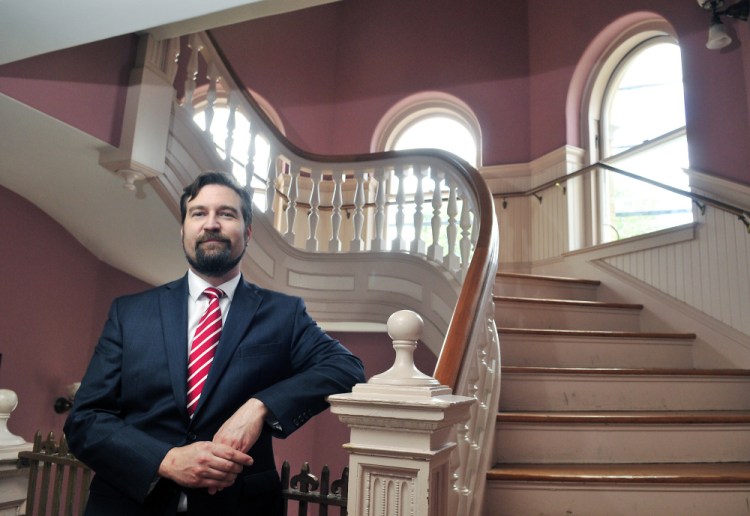 New Hallowell City Manager Nate Rudy poses for a photo on Thursday in City Hall.