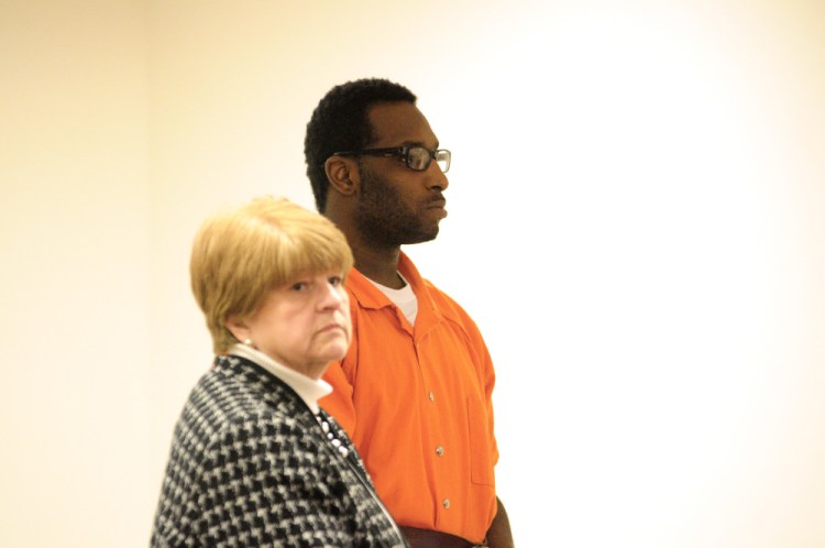 Defense attorney Pamela Ames, shown here in a 2015 file photo standing next to David W. Marble Jr., 30, of Rochester, New York, is asking for a hearing to find out what the state has promised another man for cooperating in an investigation that alleges Marble killed two people on Dec. 25, 2015.
