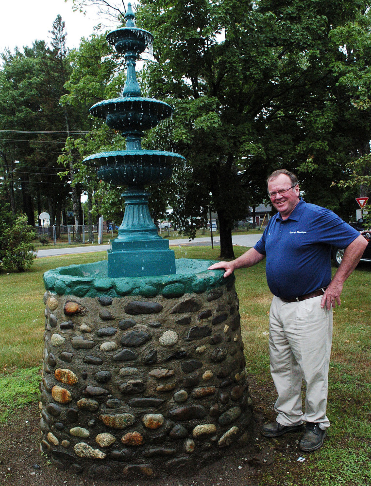 Greg Dore, the Skowhegan roads commissioner stands beside a new water fountain at the park off North Avenue and Jewett Street. The fountain was installed after the original one was vandalized three years ago.
