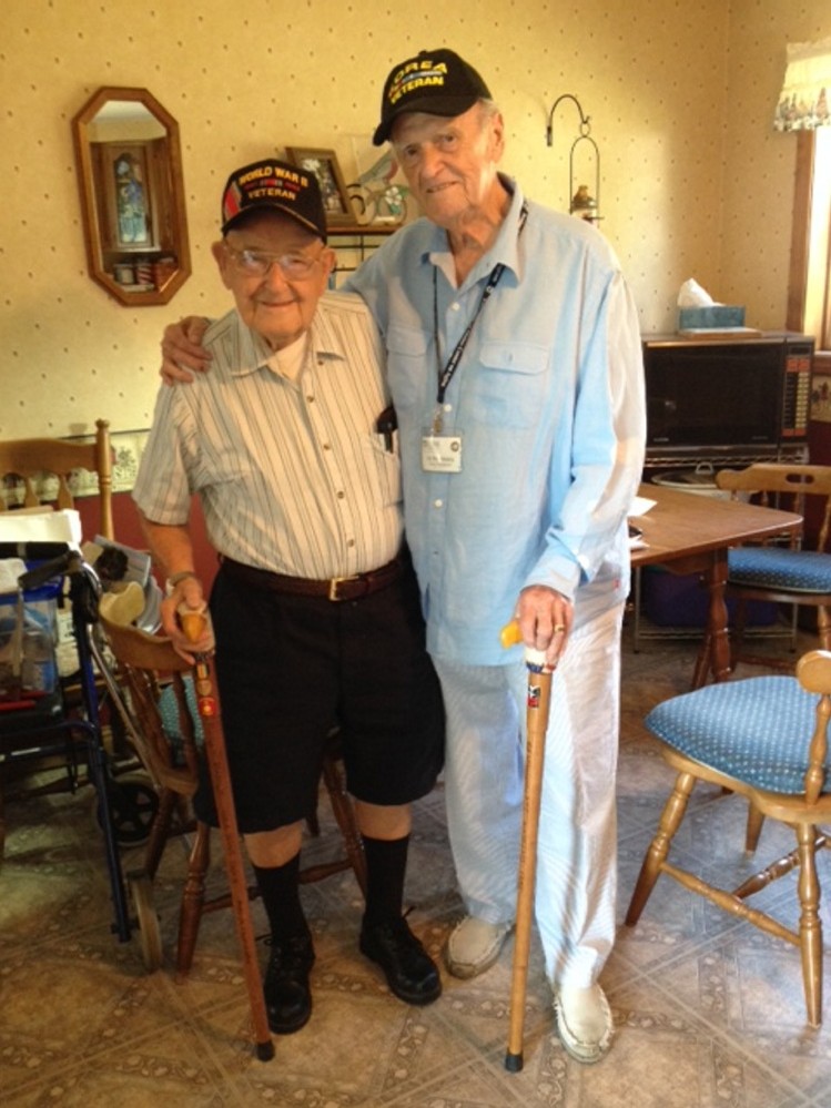 Harry Dixon, 93, of Skowhegan, at left, and his senior companion, Ed Morrissey, 85, of Norridgewock, at Dixon's home Tuesday.