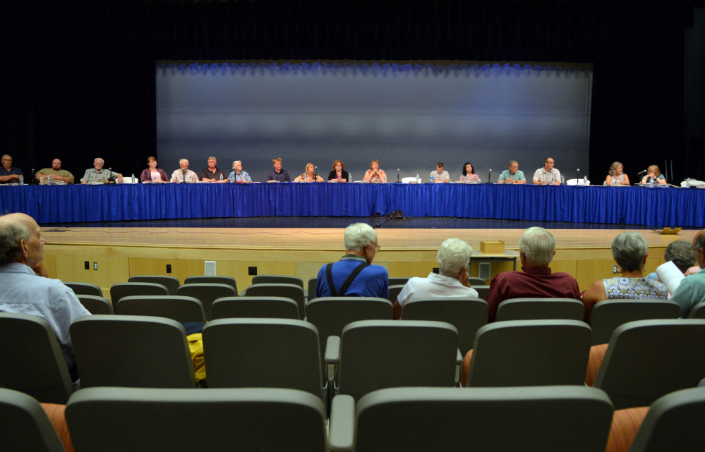 The Regional School Unit 9 board of directors presides over a districtwide school budget meeting Thursday in Bjorn Auditorium at Mt. Blue High School in Farmington.