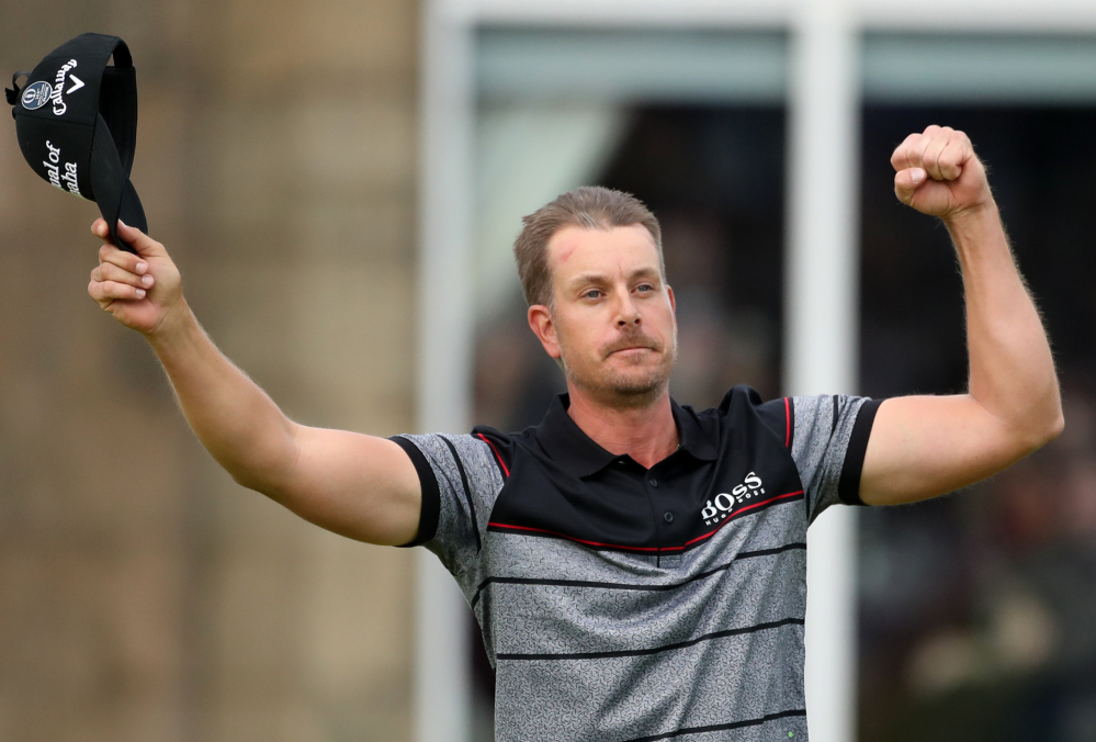Henrik Stenson celebrates his win Sunday at the British Open after putting out on the 18th green at Royal Troon Golf Club, in Troon, Scotland.