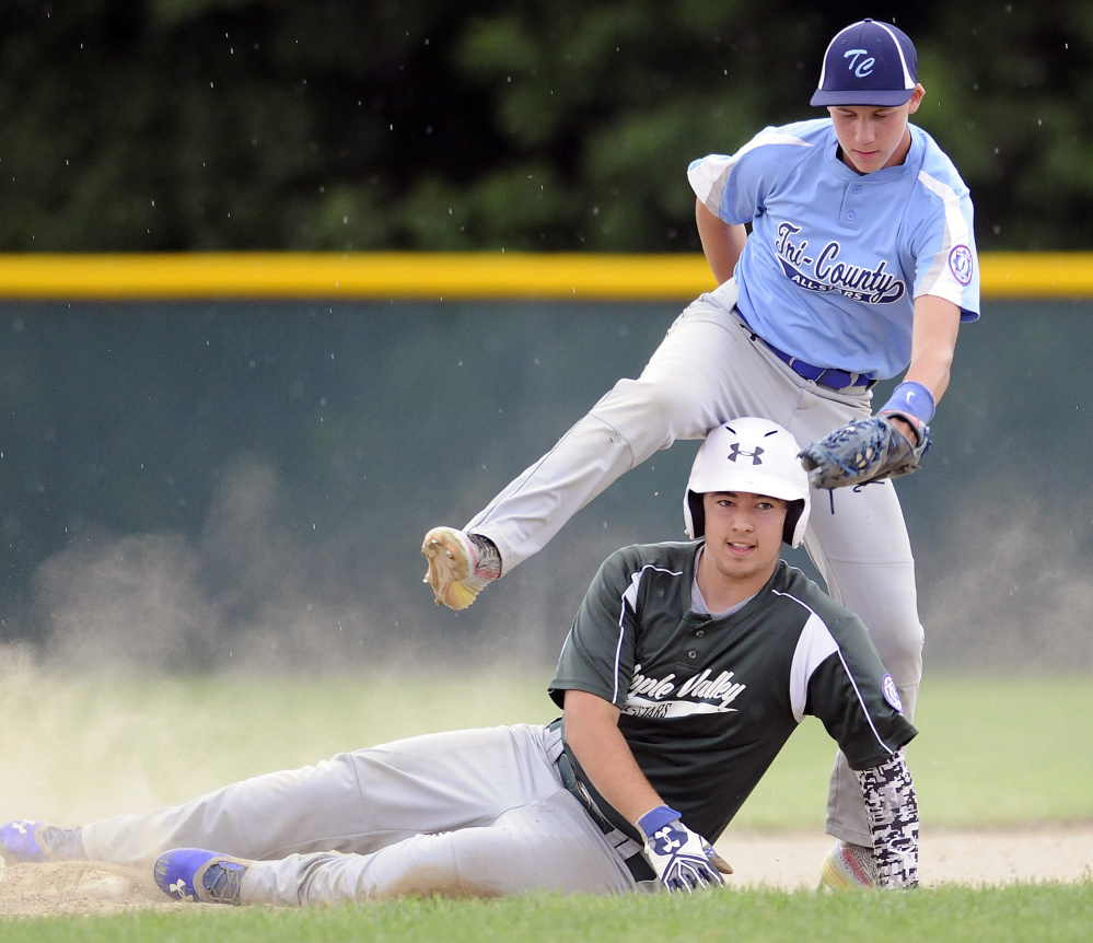 Apple Valley's Reid Cote gets picked off at second by Tri County's Ethan Laubauskas during the 13-15 Babe Ruth state championship game Monday night in Augusta.