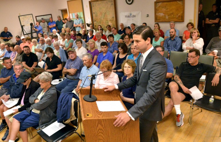 Waterville Mayor Nick Isgro addresses the City Council on Tuesday from the public microphone to urge a vote to sustain his budget veto during a meeting in the council chamber at The Center in downtown Waterville.