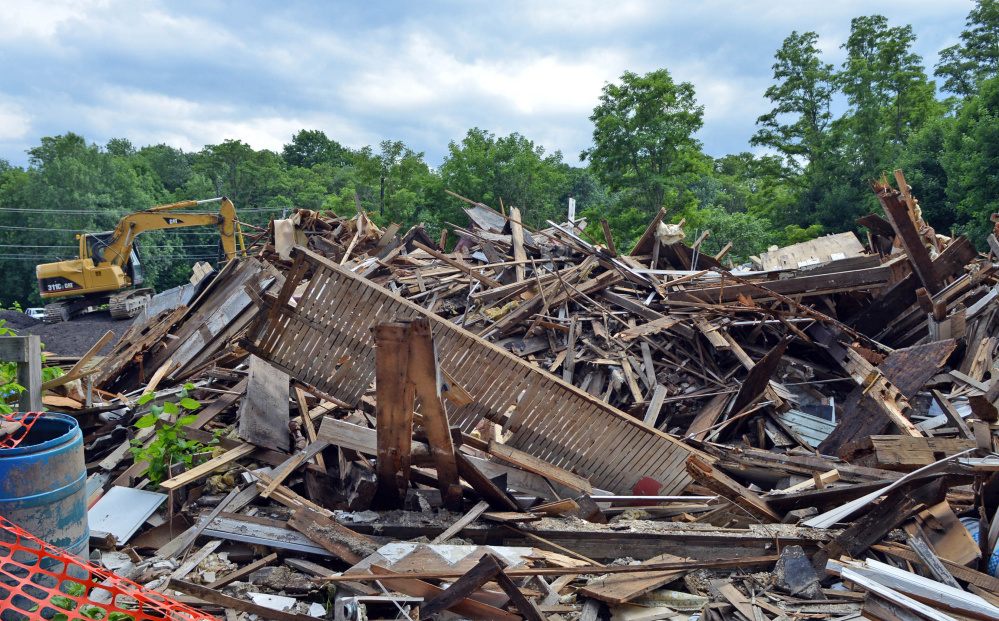 The rubble of a building is all that remains at 2 Lithgow St. in Winslow. The owner said he has no current plans for the former Fortin's Home Furnishings warehouse site.
