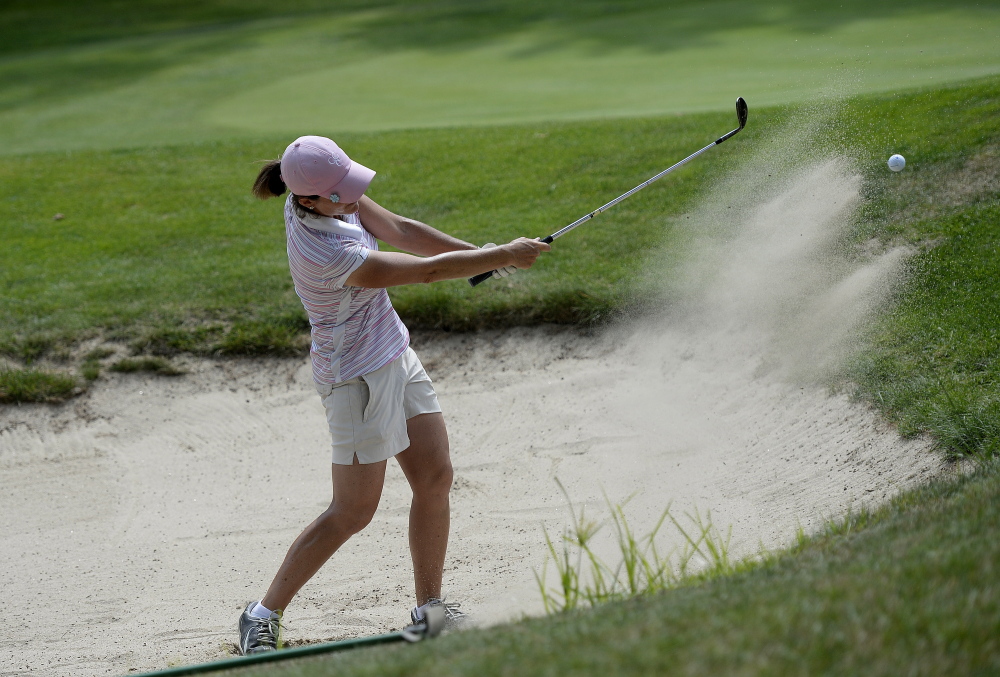 Staci Creech plays a shot out of a bunker during last year's Maine Women's Am. (Staff file photo)